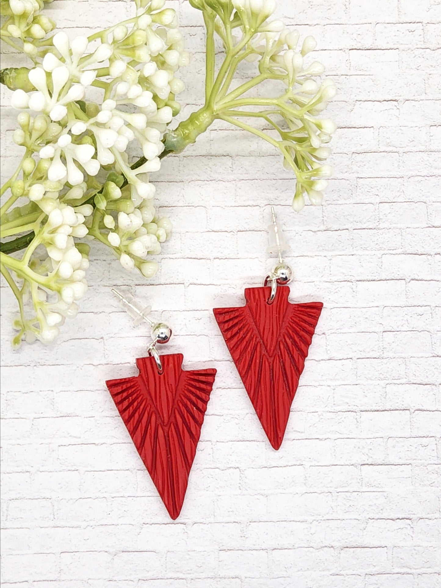 CARMINE RED EMBOSSED ARROW POLYMER CLAY EARRINGS