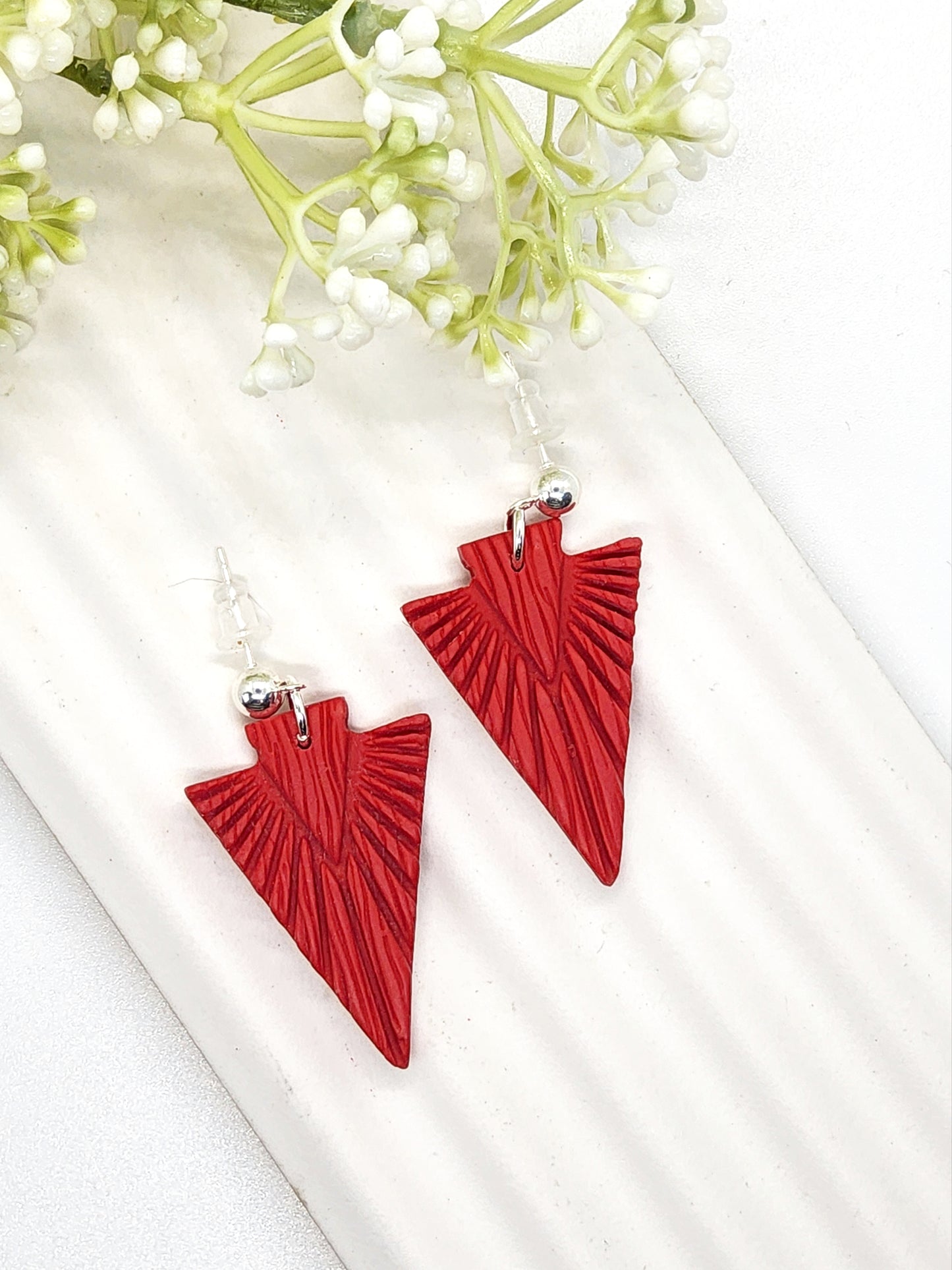 CARMINE RED EMBOSSED ARROW POLYMER CLAY EARRINGS